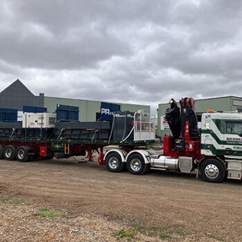 Truck Wheel Wash unit on truck leaving PR Water